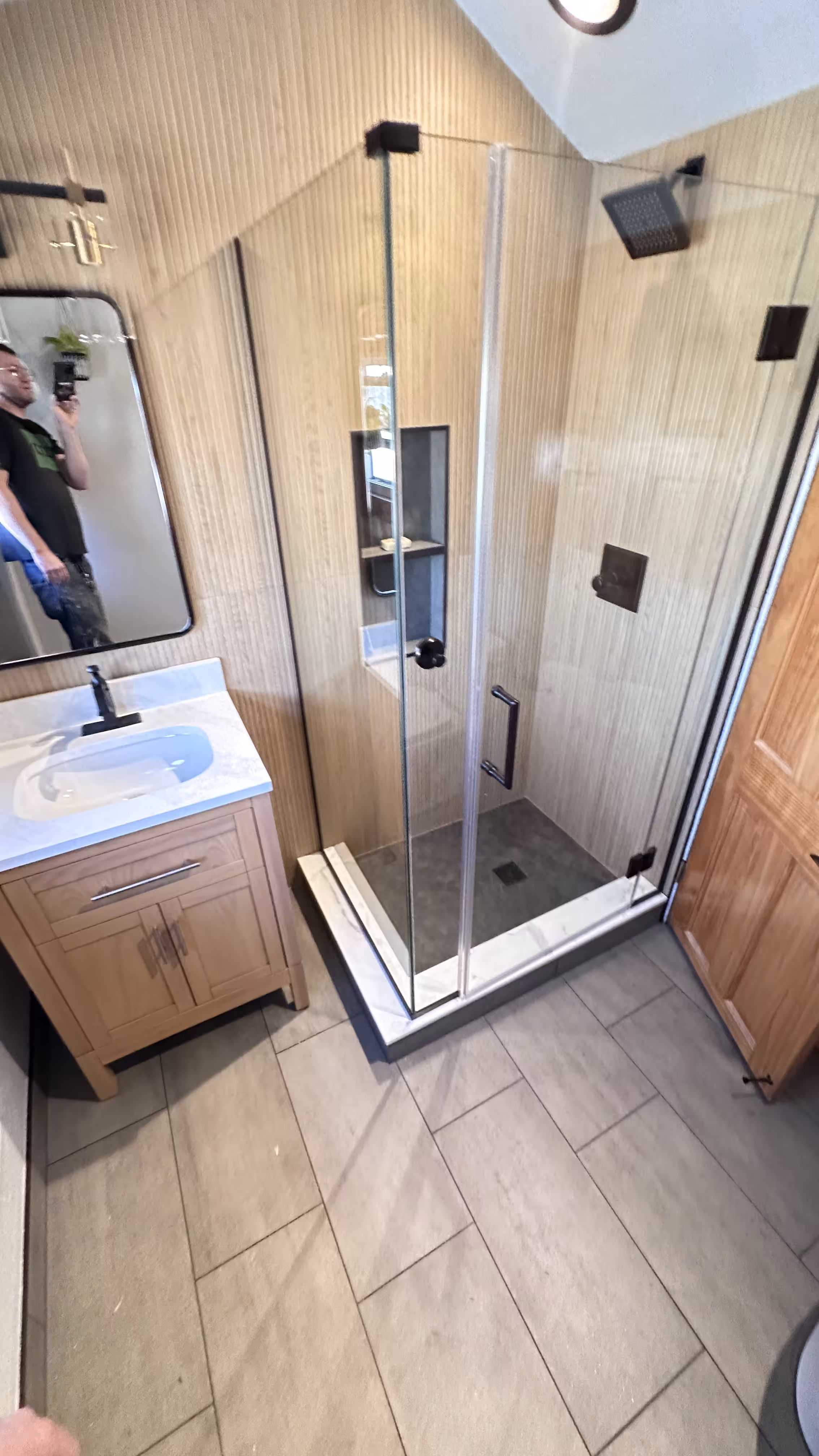 Custom shower remodel in Denver with modern large-format tile