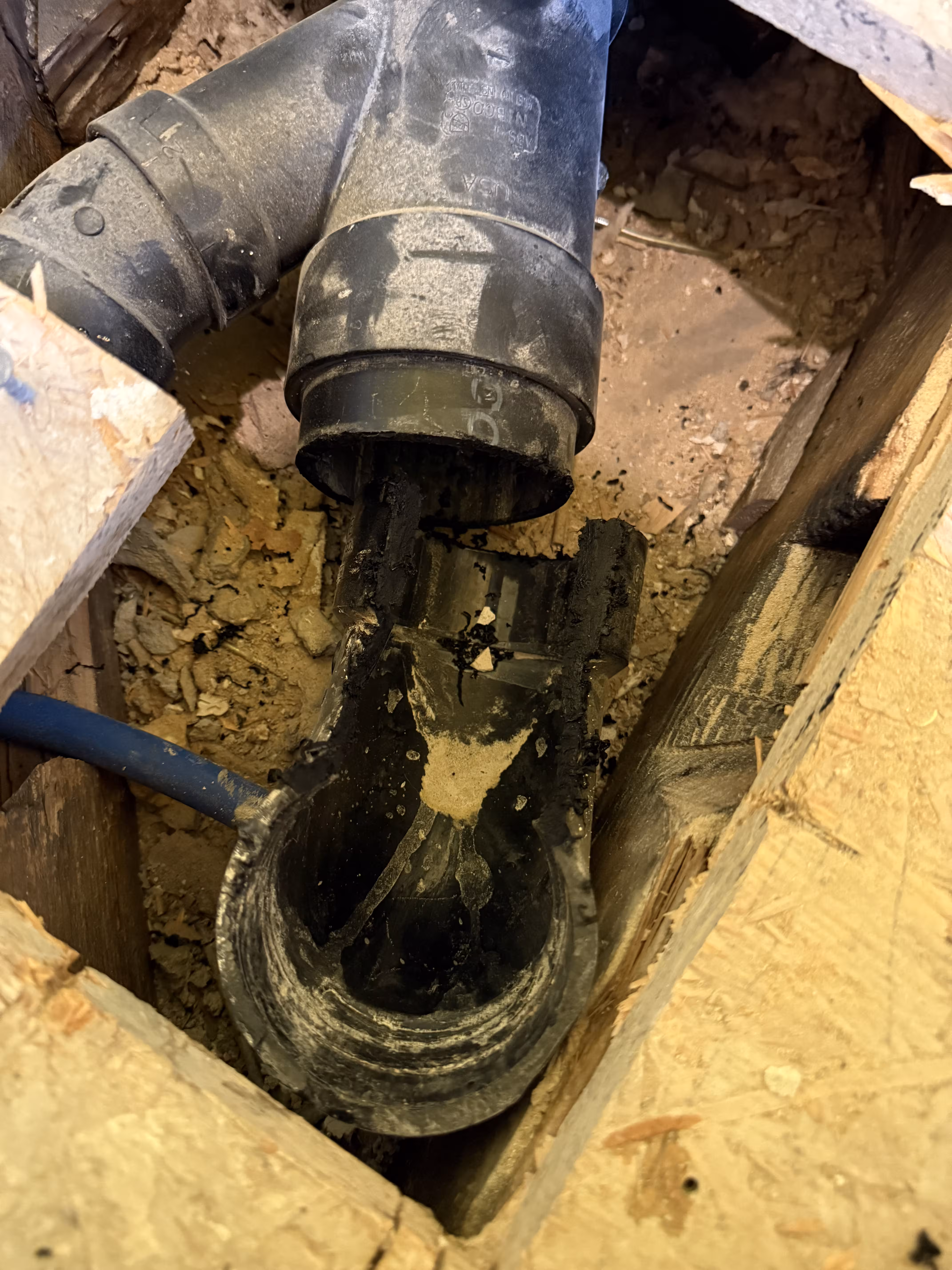 Drain reconnection and toilet adjustment during a Denver shower remodel