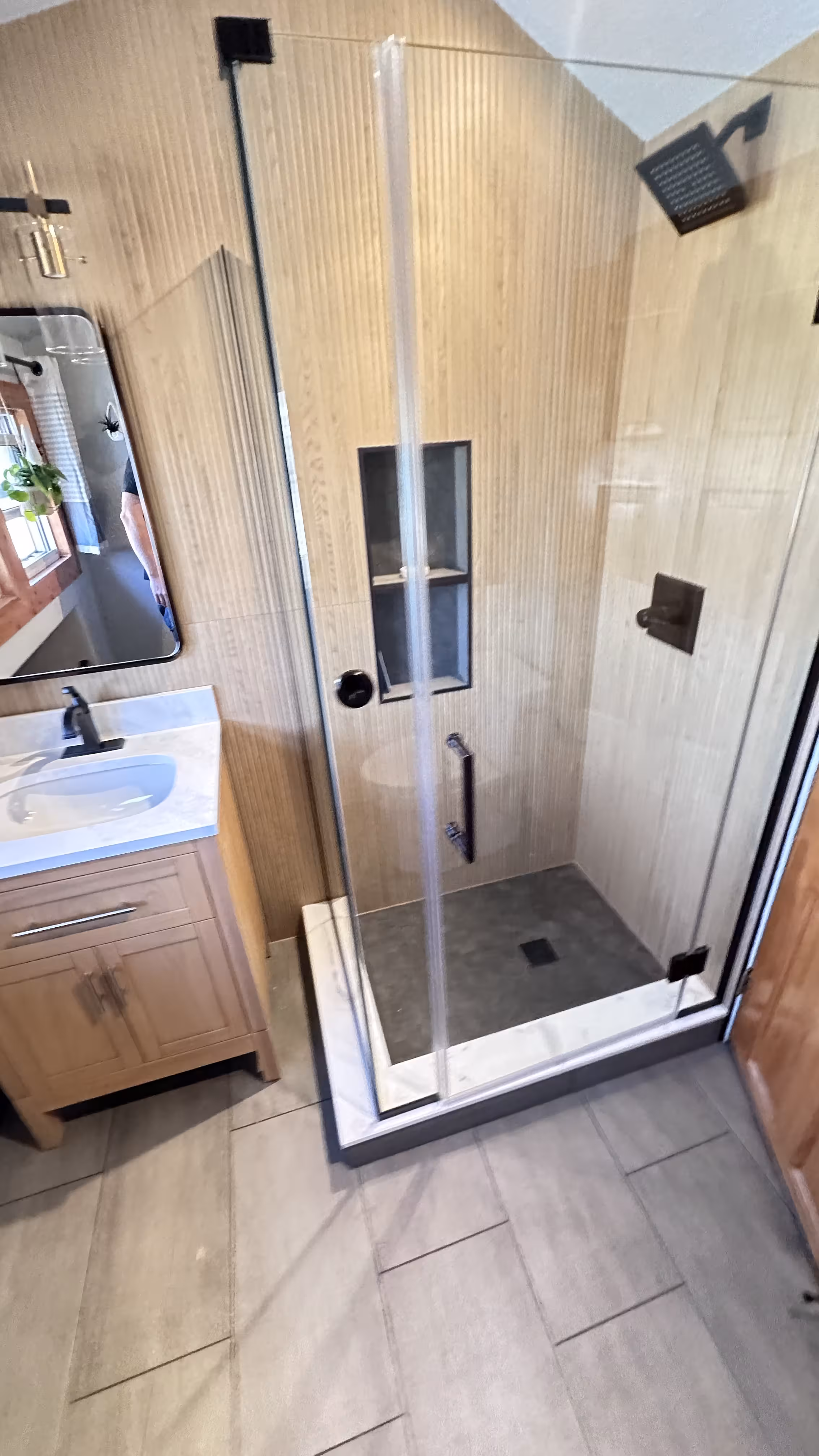 Tile installation progress for custom shower in Denver