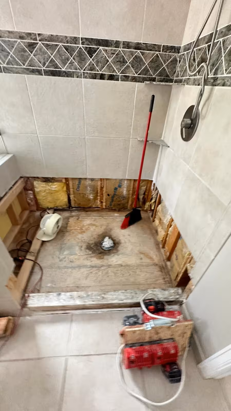 Partial shower demolition in DTC with upper wall tile preserved