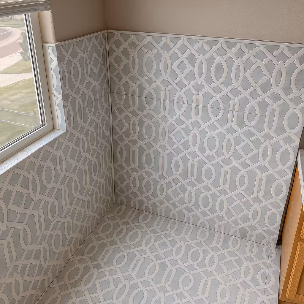 Checkerboard floral pattern tile in a Parker, CO shower, a unique 2025 tile trend.