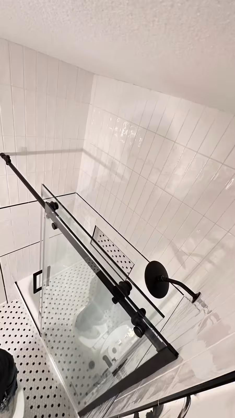 New vanity wallpaper and mosaic floor detail in Aurora bathroom remodel