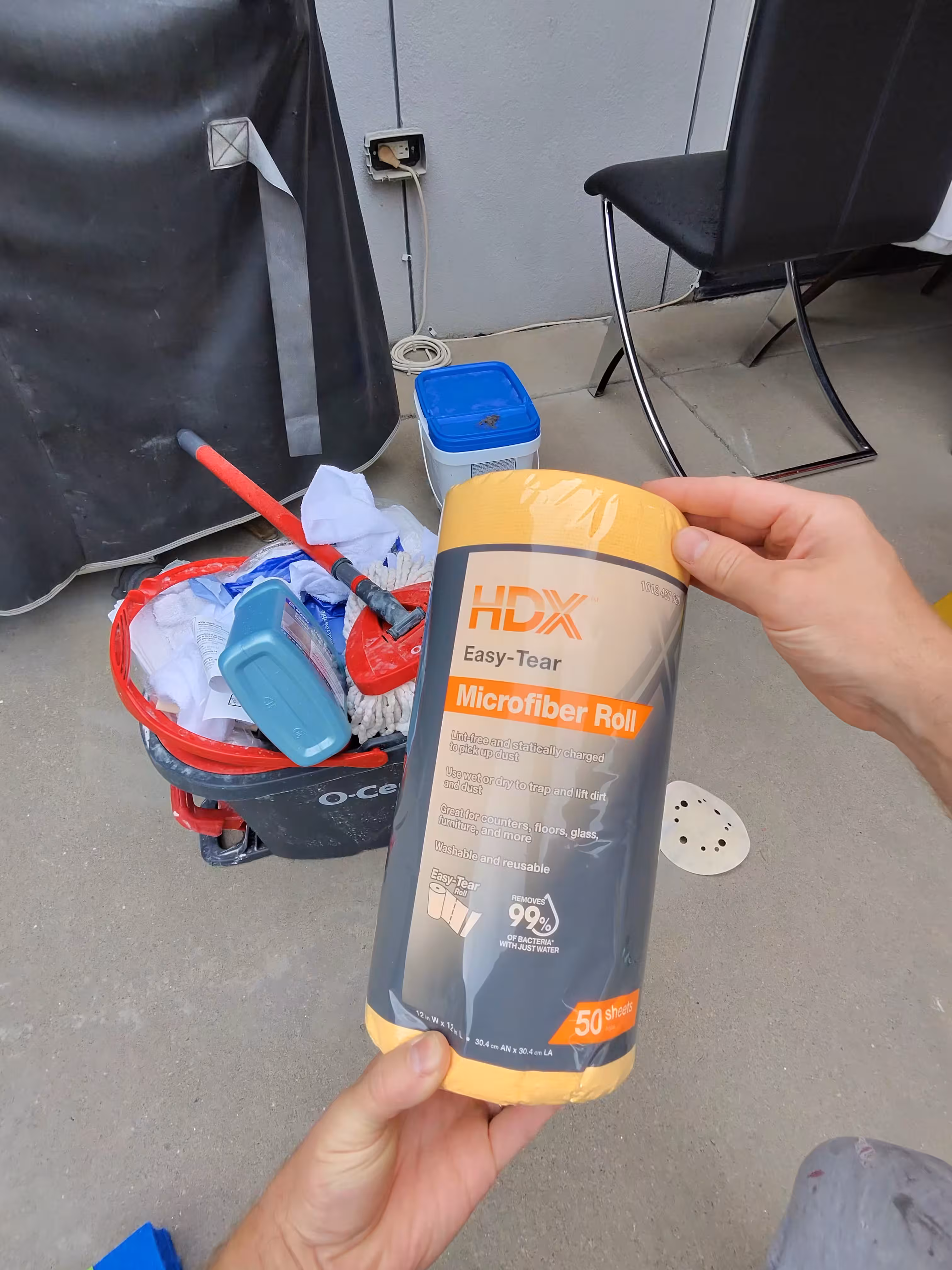 Microfiber cloths and cleaning supplies for various tile types