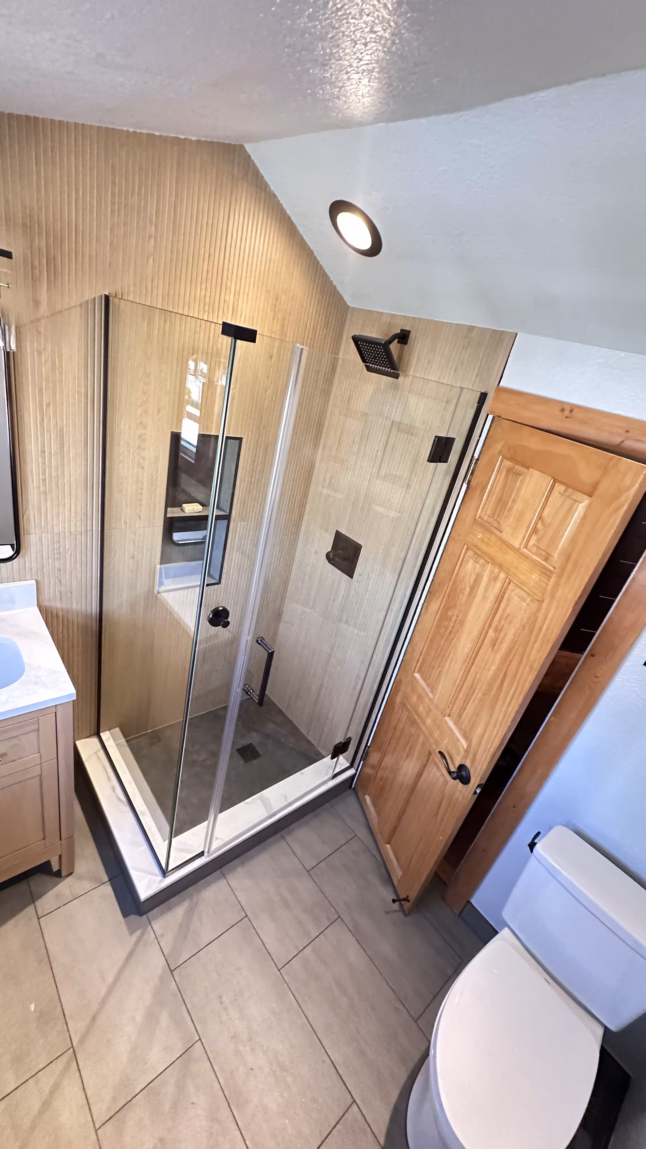 Waterproofing installation during Denver shower remodel